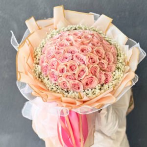 Delicate pink roses wrapped in love and grace