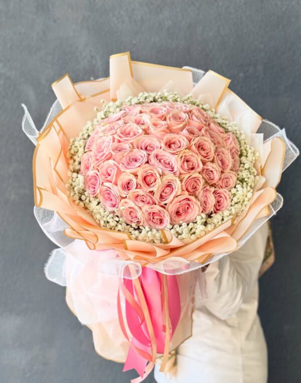 Delicate pink roses wrapped in love and grace